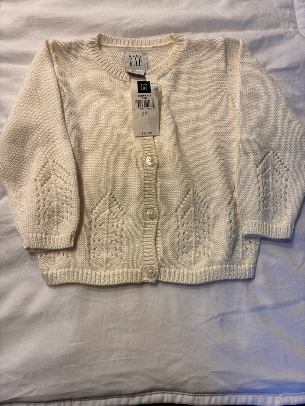 Baby GAP Vintage “99”
Cream Knit Button-Front toddler 12-18 months Sweater